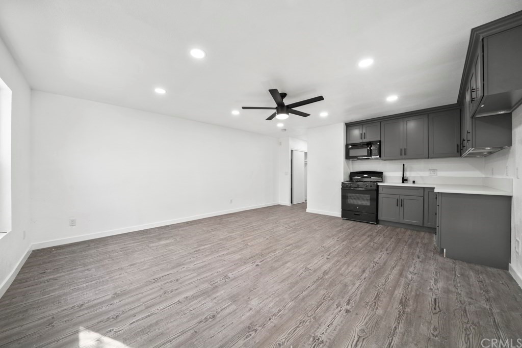 1202 Mahanna Avenue Long Beach, CA 90813 - Photo 13 of 32 a view of kitchen with microwave and cabinets
