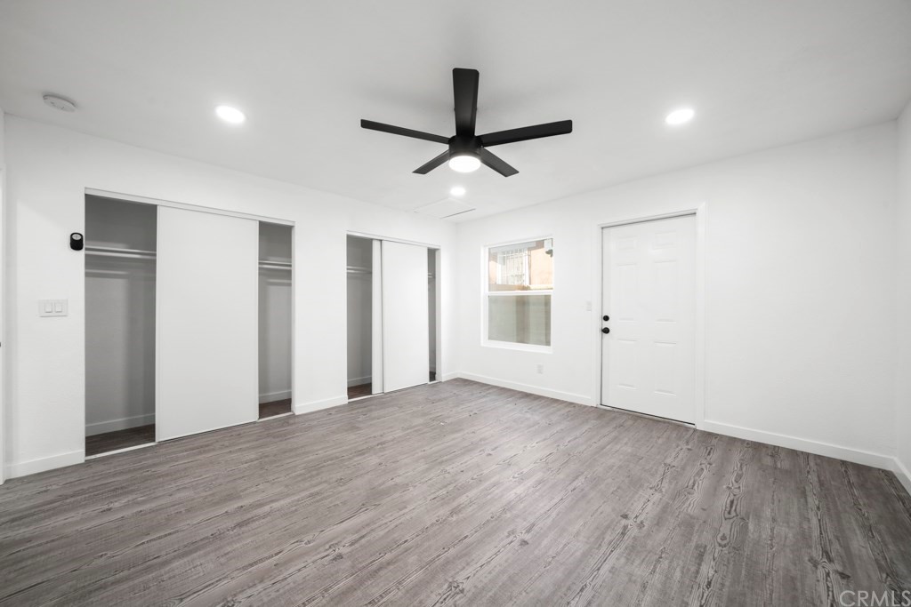 1202 Mahanna Avenue Long Beach, CA 90813 - Photo 26 of 32 a view of empty room with wooden floor and ceiling fan