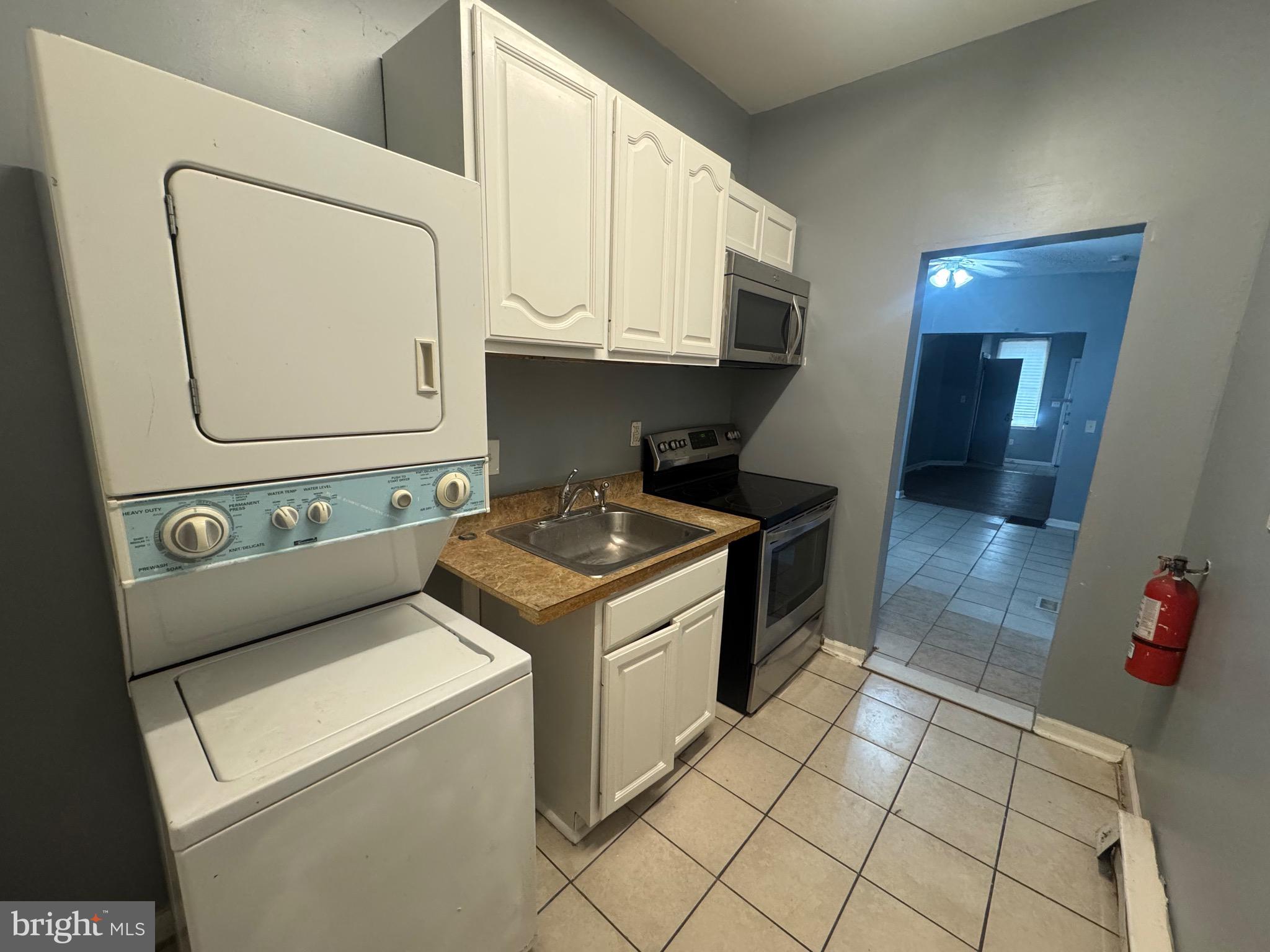 5000 Litchfield Avenue, Unit 1 Baltimore, MD 21215 - Photo 8 of 16 a view of washer and dryer