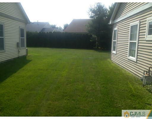 25 Riva Boulevard Brick, NJ 08723 - Photo 16 of 19 a view of outdoor space and yard