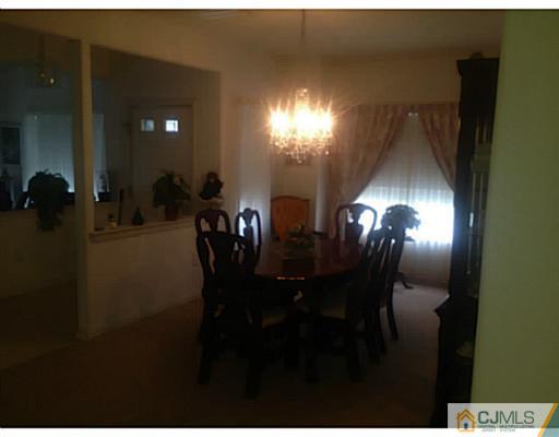 25 Riva Boulevard Brick, NJ 08723 - Photo 3 of 19 a view of a dining room with furniture