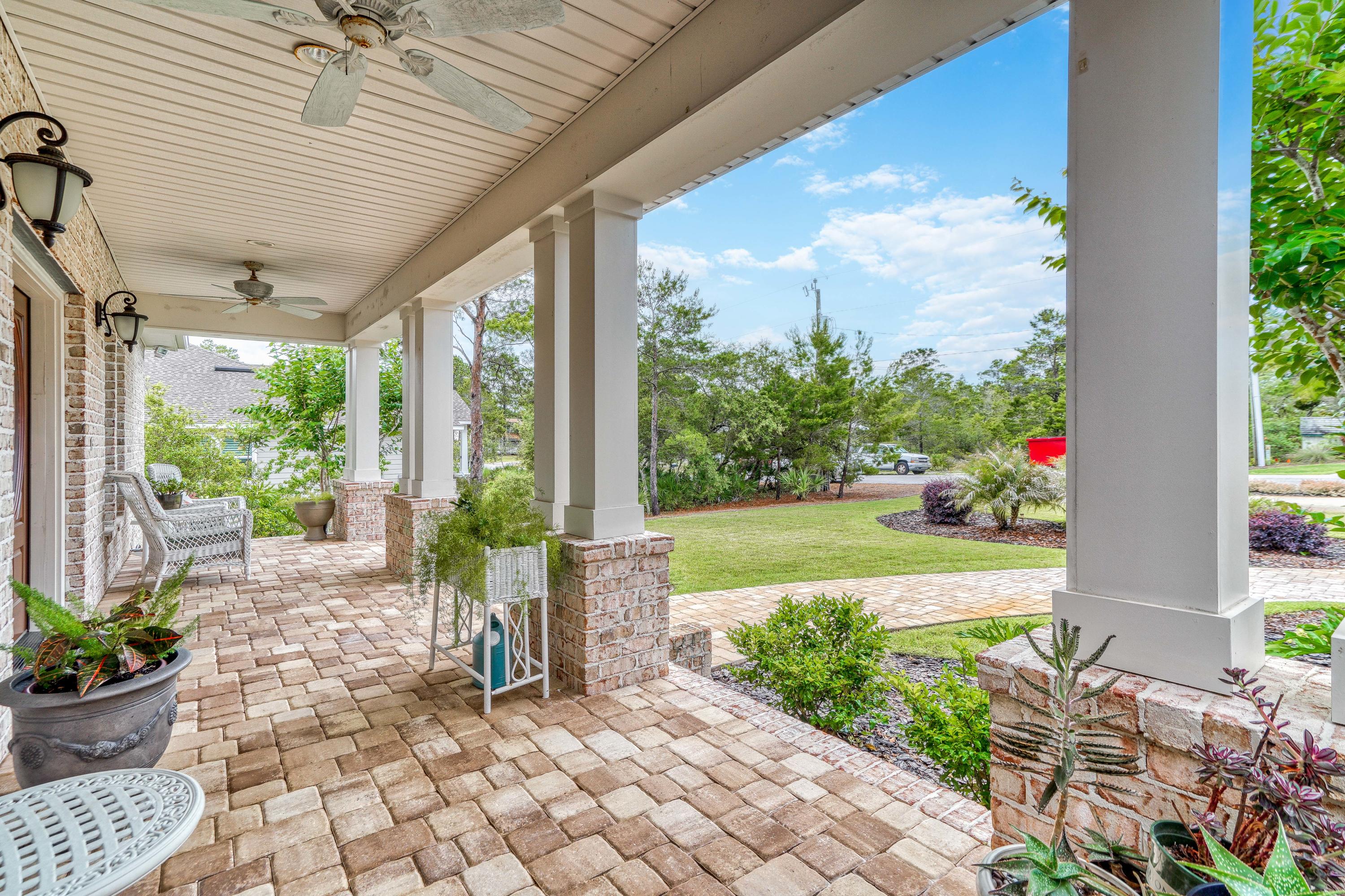 488 Ridge Road Santa Rosa Beach, FL 32459 - Photo 2 of 46 a front view of a house with garden