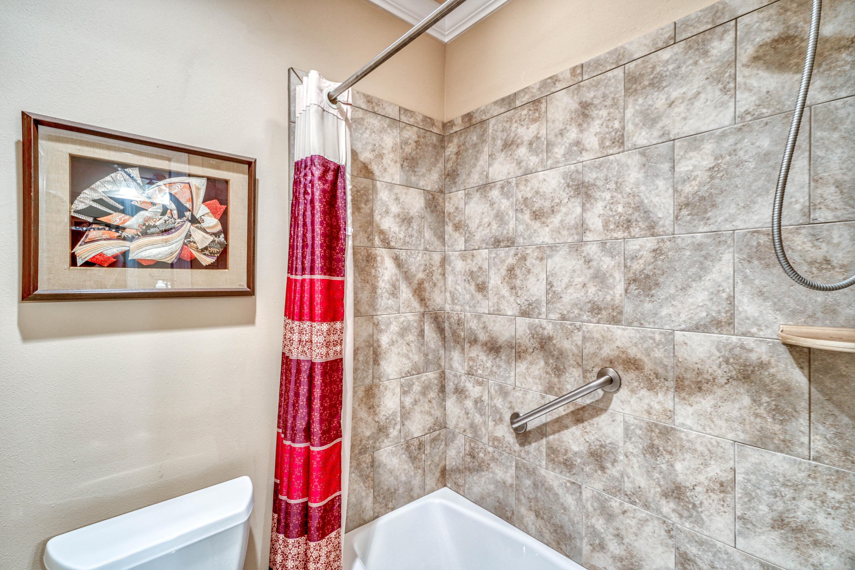 488 Ridge Road Santa Rosa Beach, FL 32459 - Photo 28 of 46 a bathroom with a shower and a toilet next to a shower