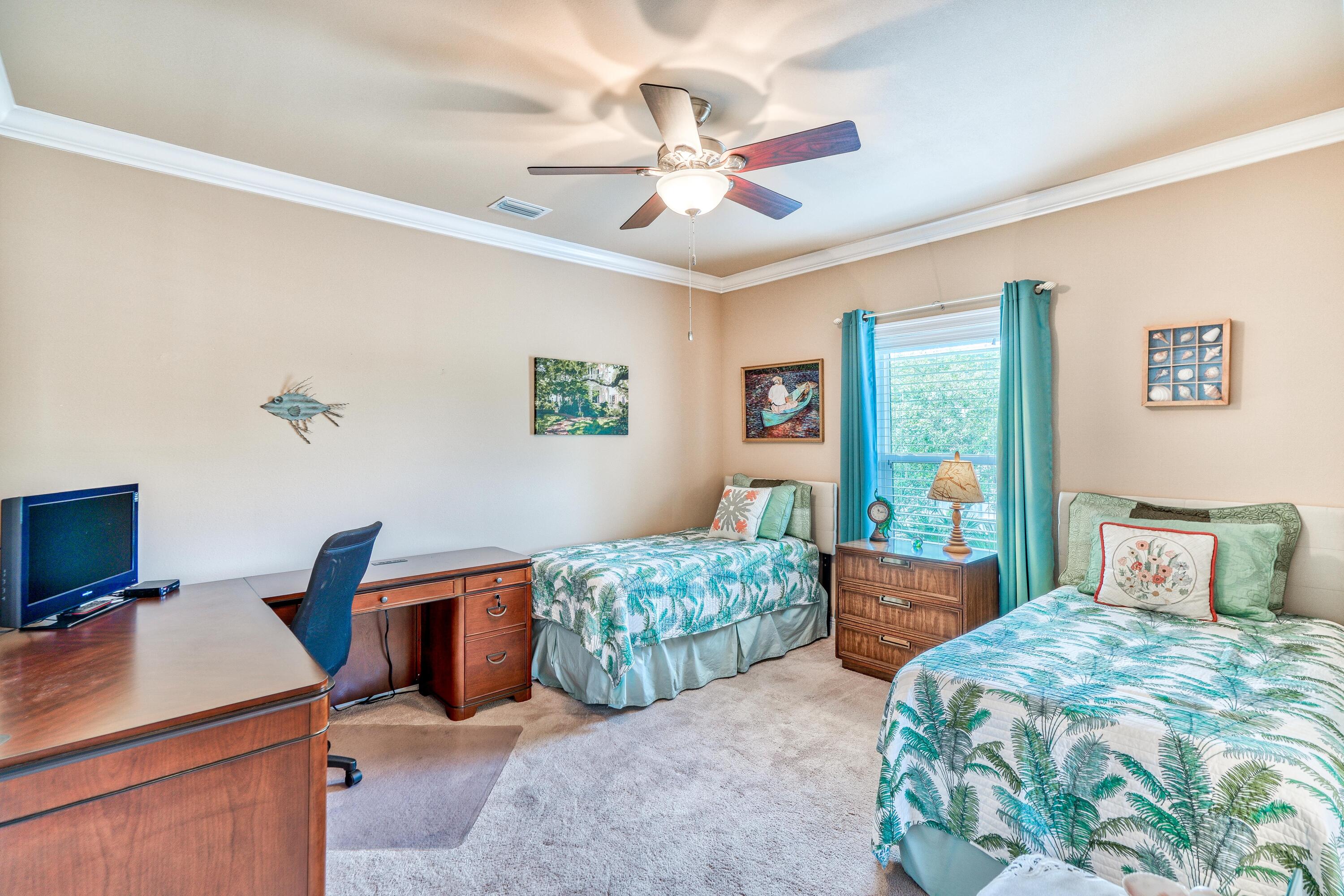 488 Ridge Road Santa Rosa Beach, FL 32459 - Photo 29 of 46 a bedroom with two beds and a desk