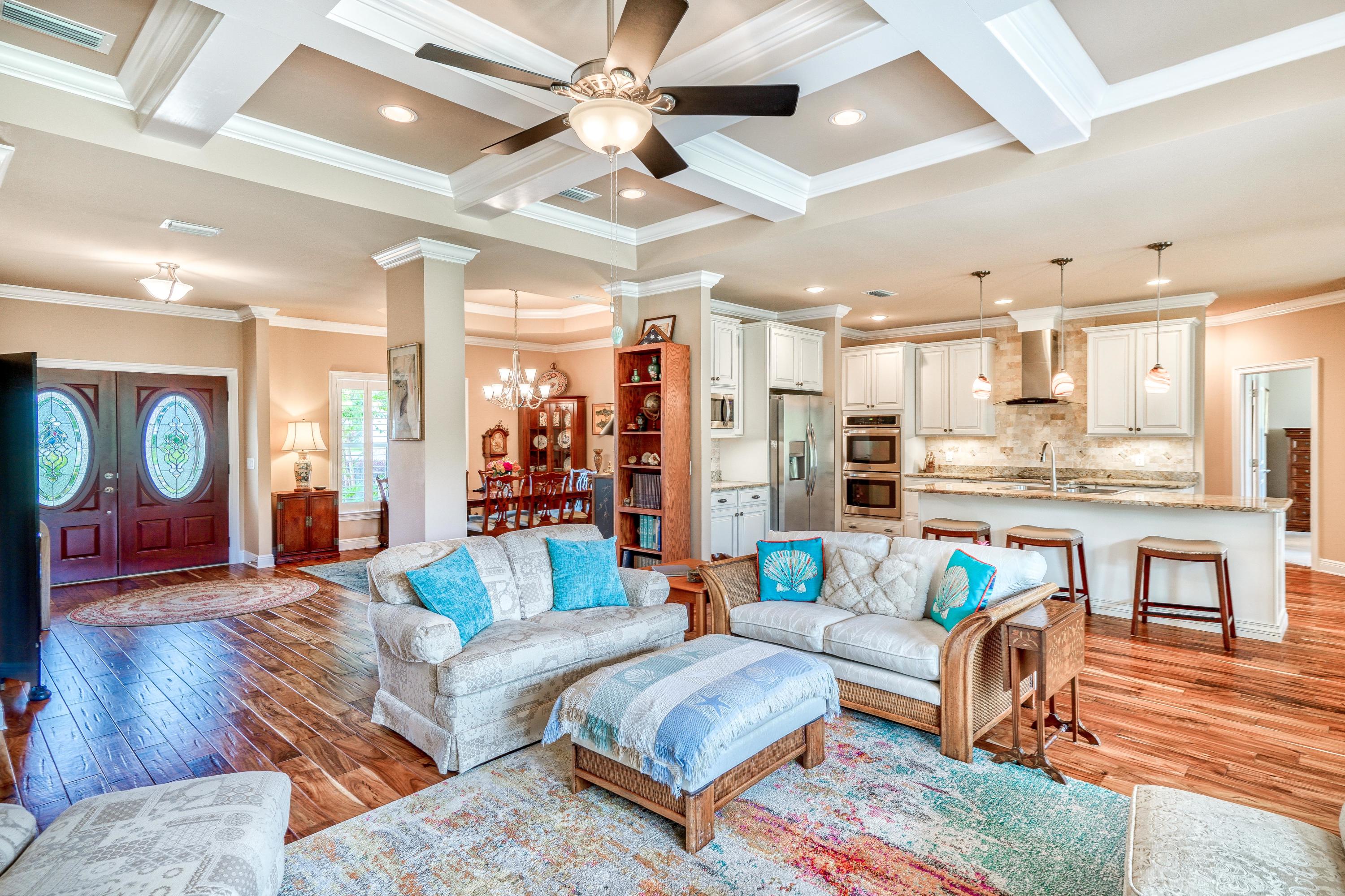 488 Ridge Road Santa Rosa Beach, FL 32459 - Photo 3 of 46 a living room with fireplace furniture and a wooden floor