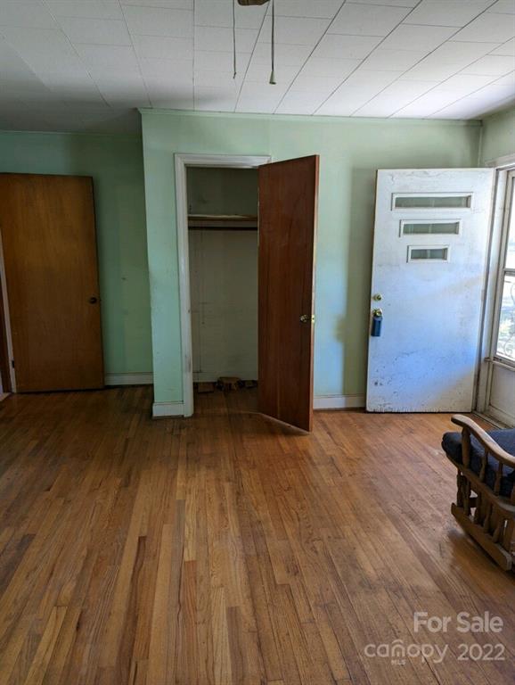 4839 Tabernacle Road Lancaster, SC 29720 - Photo 13 of 23 an empty room with wooden floor and closet