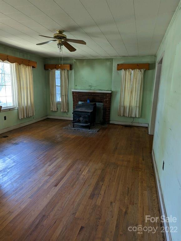 4839 Tabernacle Road Lancaster, SC 29720 - Photo 15 of 23 a view of livingroom with hardwood floor and a ceiling fan