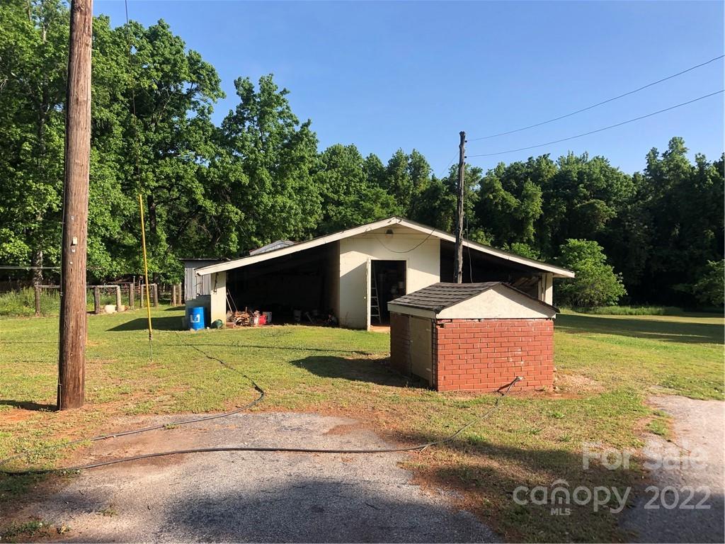 4839 Tabernacle Road Lancaster, SC 29720 - Photo 2 of 23 a front view of a house with a yard