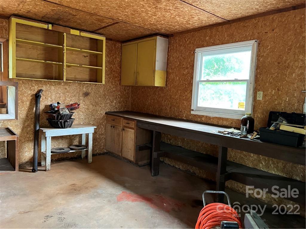 4839 Tabernacle Road Lancaster, SC 29720 - Photo 5 of 23 a kitchen that has a sink and a stove in it