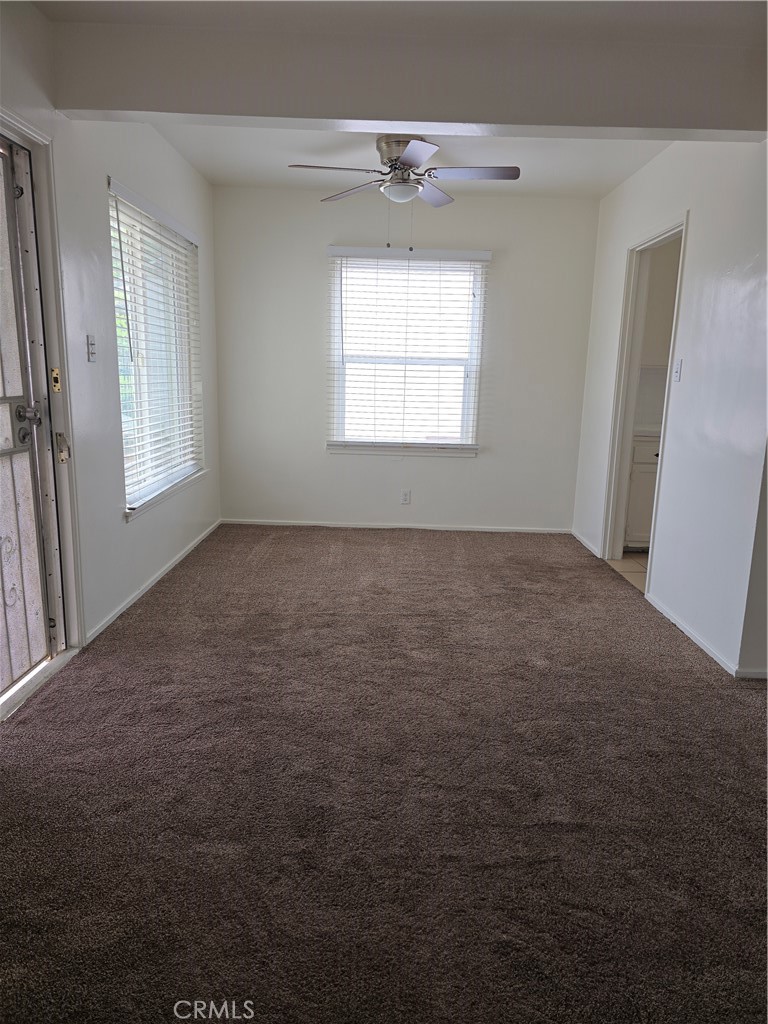 9542 Rex Road Pico Rivera, CA 90660 - Photo 7 of 11 an empty room with windows