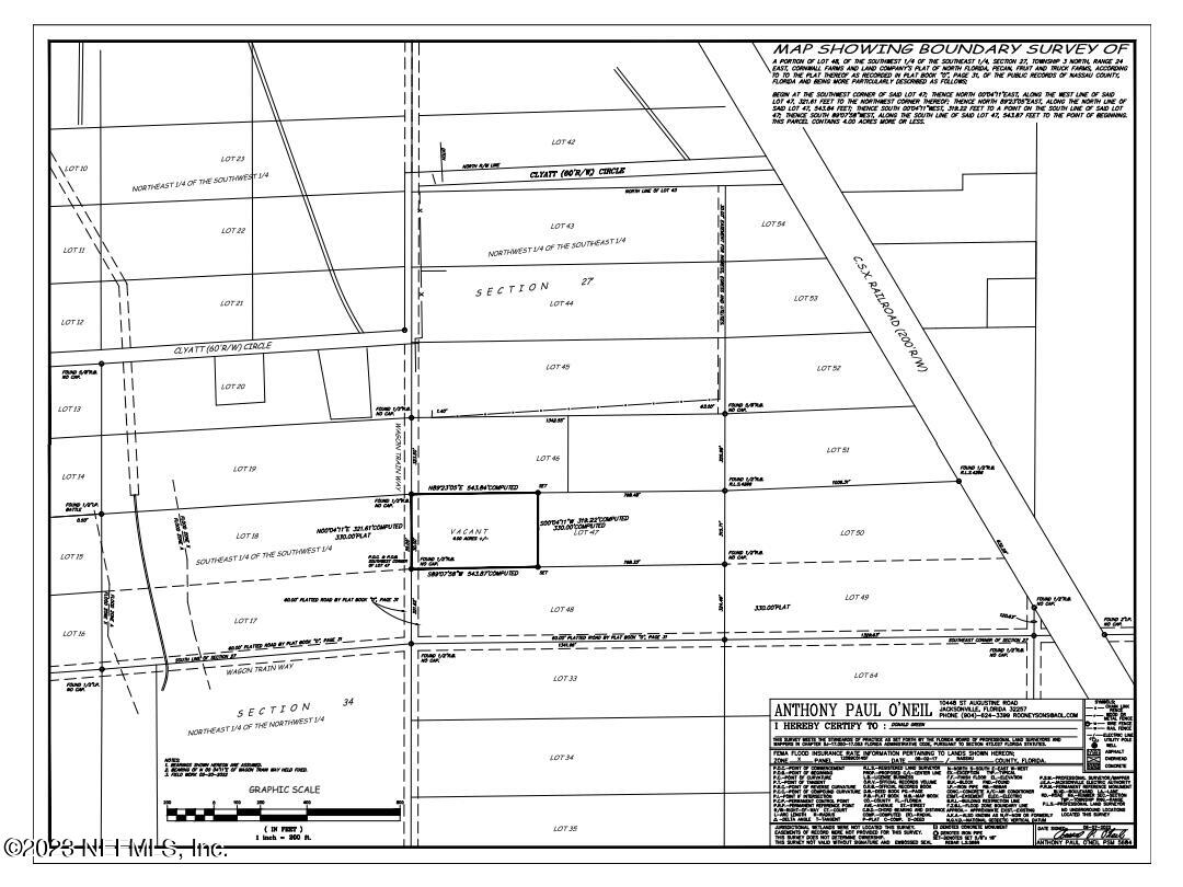 36150 Wagon Train Way Hilliard, FL 32046 - Photo 2 of 4 a picture of a glass window