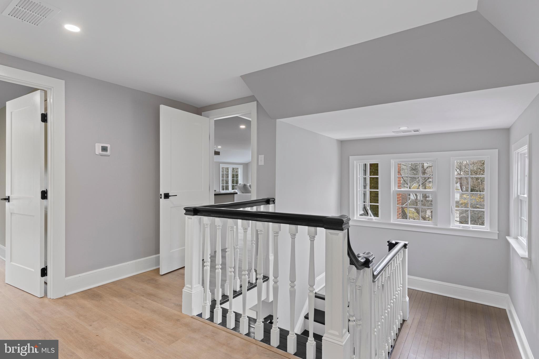 222 Rutgers Avenue Swarthmore, PA 19081 - Photo 31 of 40 a view of a room with wooden floor and windows