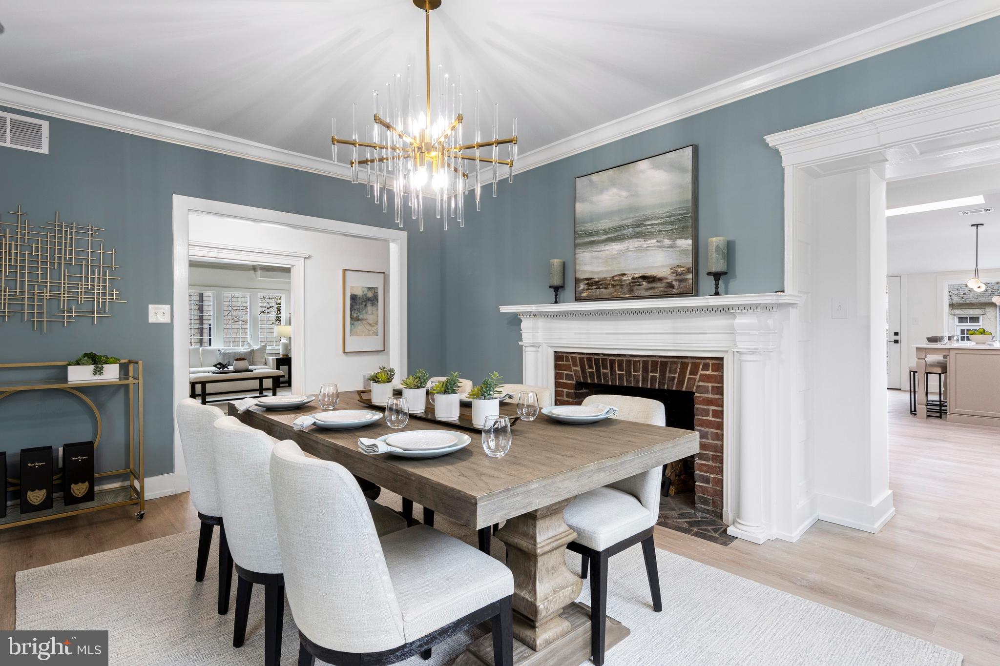 222 Rutgers Avenue Swarthmore, PA 19081 - Photo 8 of 40 a view of a dining room with furniture a chandelier and wooden floor