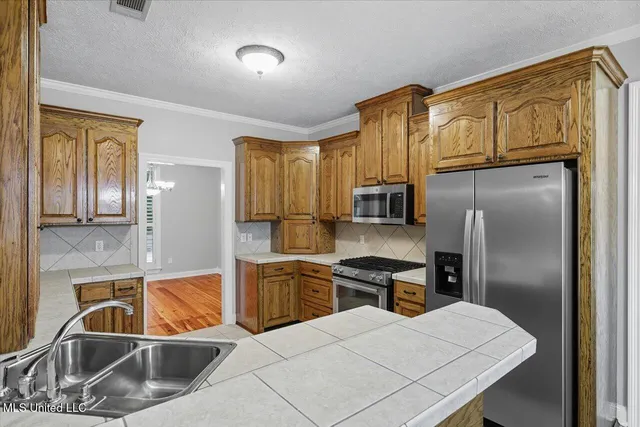 $390,000 | 1060 Suzanna Drive, Raymond, MS 39154