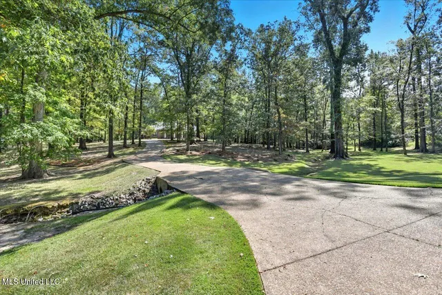 $390,000 | 1060 Suzanna Drive, Raymond, MS 39154