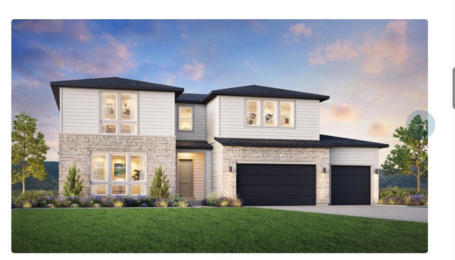 Contemporary two-story residence featuring a stone and horizontal siding exterior