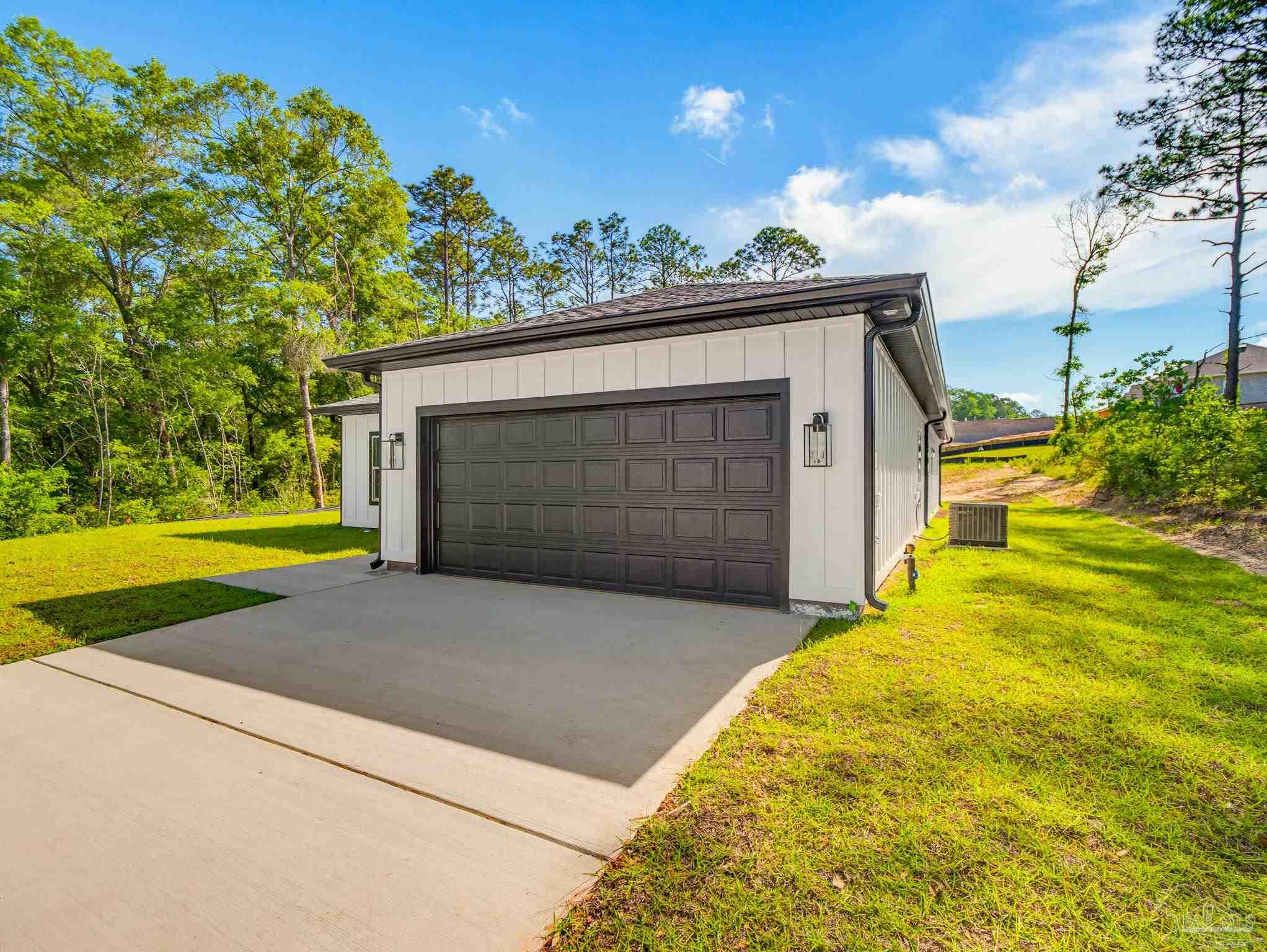 5724 Riviera Drive Milton, FL 32583 - Photo 3 of 52 a view of backyard of the house