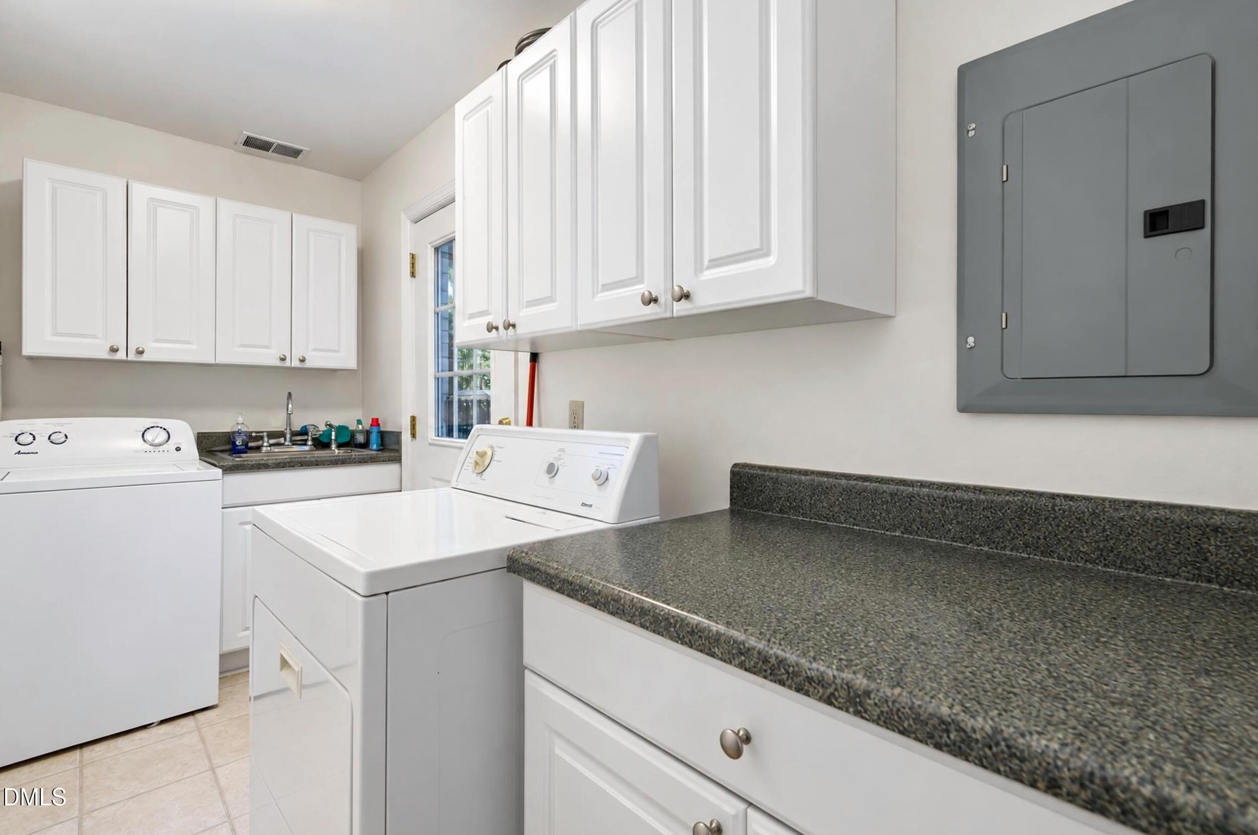 1302 Kingston Ridge Road Cary, NC 27511 - Photo 19 of 45 Laundry room
