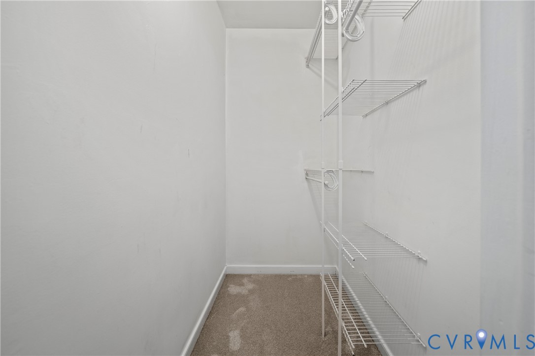 13830 Crosstimbers Road Midlothian, VA 23112 - Photo 26 of 43 Walk in closet with carpet flooring