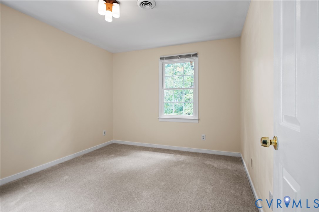 13830 Crosstimbers Road Midlothian, VA 23112 - Photo 36 of 43 Spare room featuring light colored carpet and base