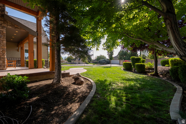 687 South 2080th Street East Springville, UT 84663 - Photo 121 of 149 Expansive front yard featuring mature trees, manicured lawns, and defined landscaping