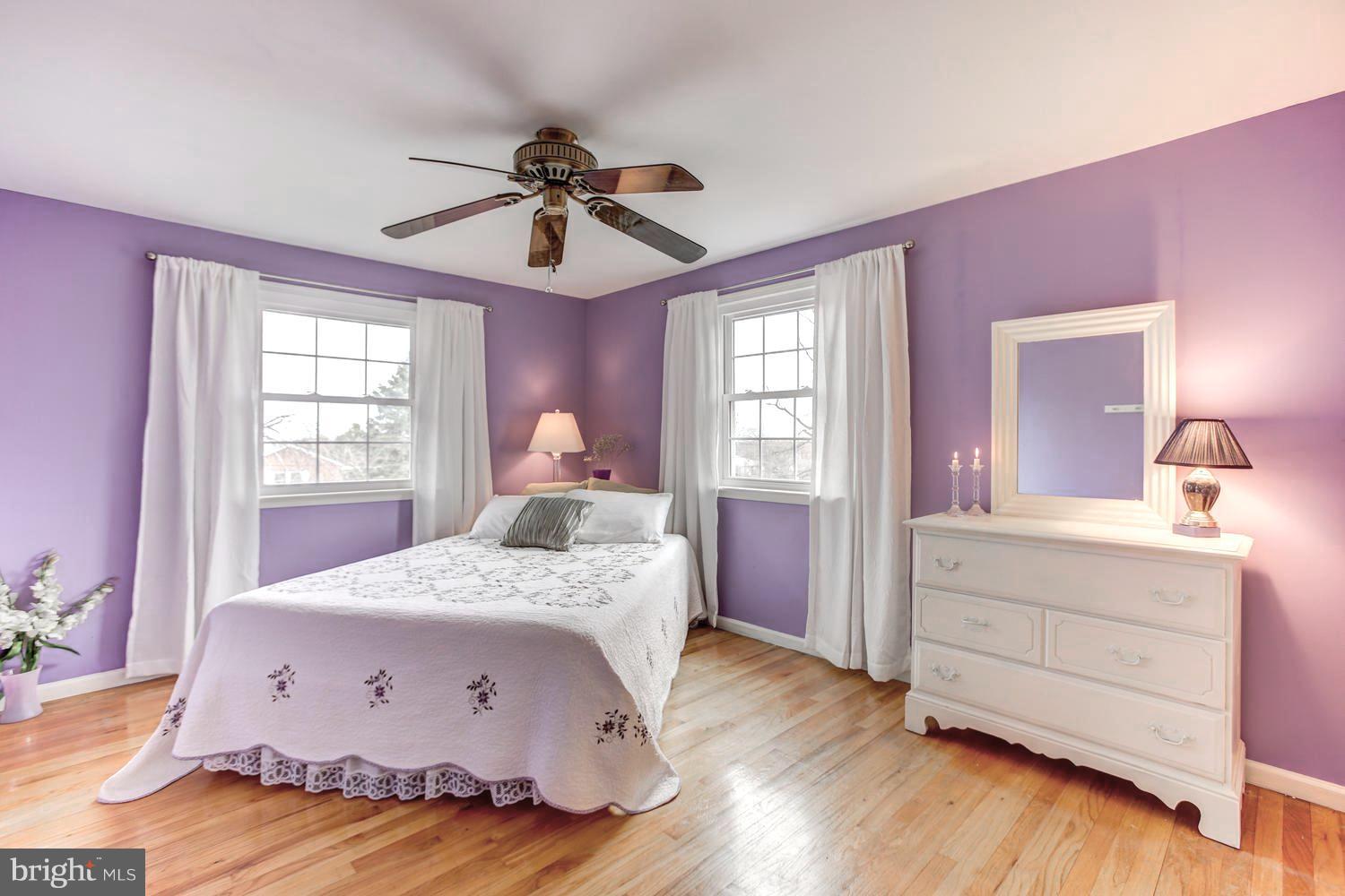 104 Cedar Street Chestertown, MD 21620 - Photo 13 of 16 a bedroom with a bed and a dresser