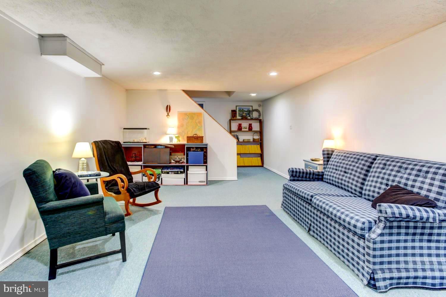 104 Cedar Street Chestertown, MD 21620 - Photo 16 of 16 a living room with furniture and a couch