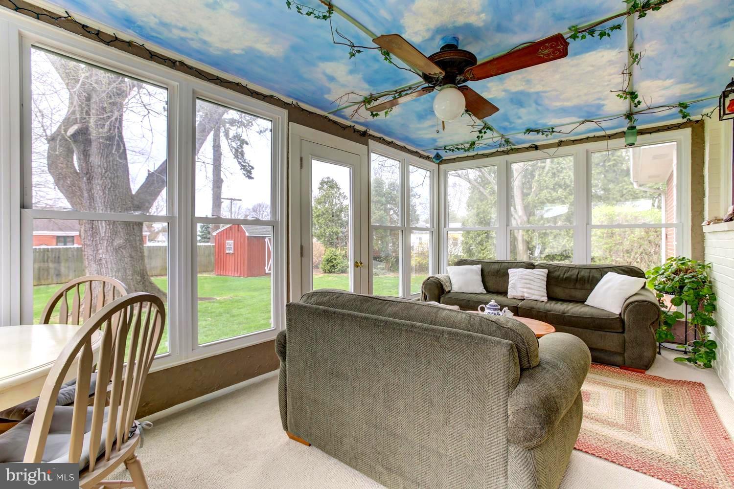 104 Cedar Street Chestertown, MD 21620 - Photo 6 of 16 a living room with furniture and a large window