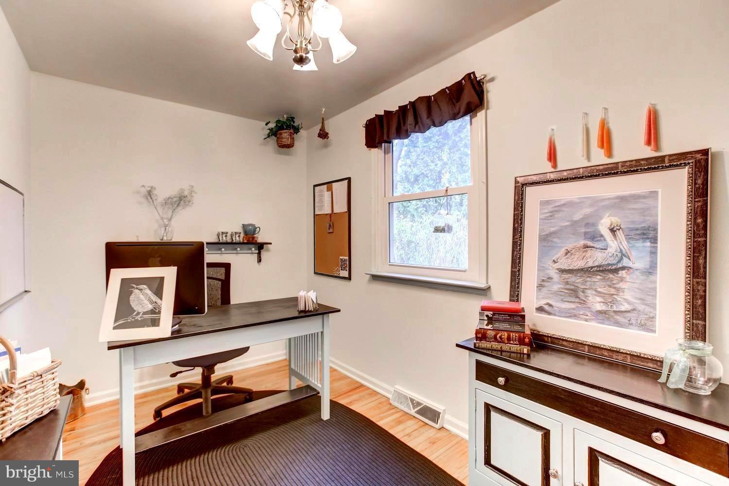 104 Cedar Street Chestertown, MD 21620 - Photo 10 of 16 a bedroom with furniture and a window