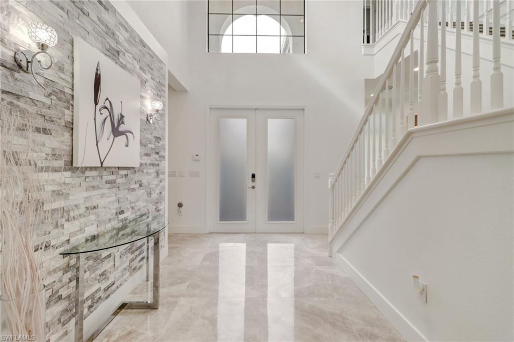 4410 Caldera Circle Naples, FL 34119 - Photo 2 of 35 a view of entryway with a front door