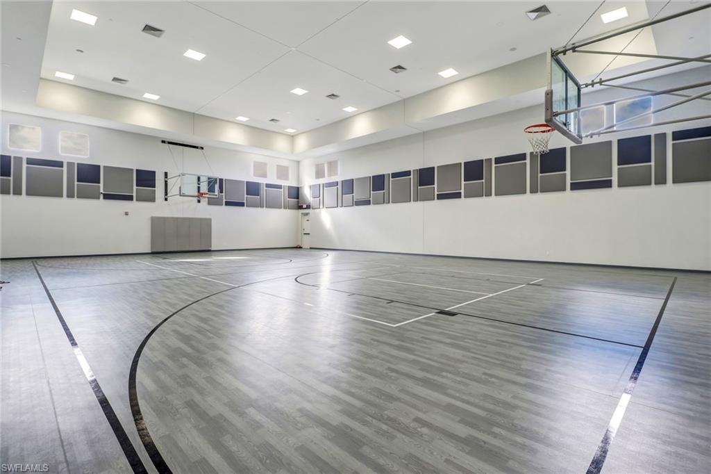 4410 Caldera Circle Naples, FL 34119 - Photo 31 of 35 a view of a large room with wooden floor