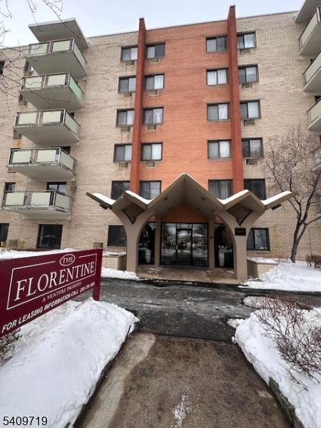 77 Prospect Avenue, Unit D Hackensack, NJ 07601 - Photo 13 of 14 a front view of a building
