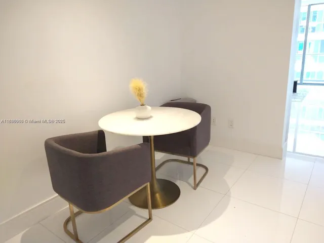 a bathroom with a sink and vanity