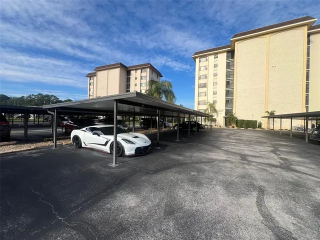 a view of swimming pool with furniture