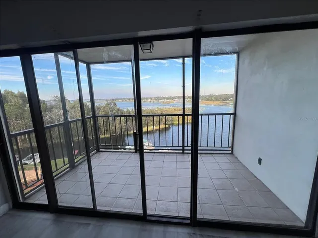 a view of staircase with open living room