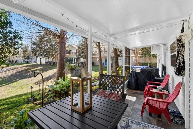 a outdoor space with lots of water view and a living room view