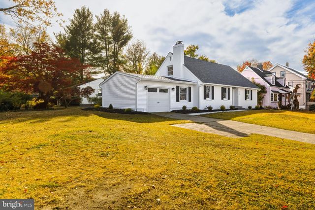 a view of a house with a swimming pool