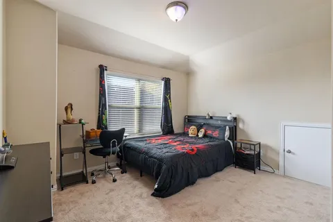 a bathroom with a sink double vanity and a mirror