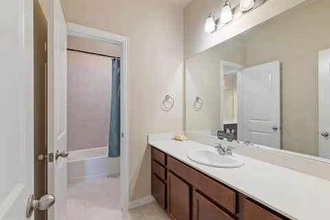 a bedroom with furniture and a bed