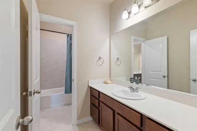 a bedroom with furniture and a bed