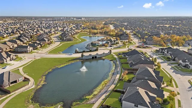 a view of swimming pool with outdoor seating