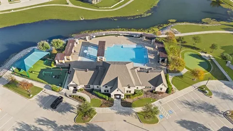 a view of a swimming pool with an ocean view