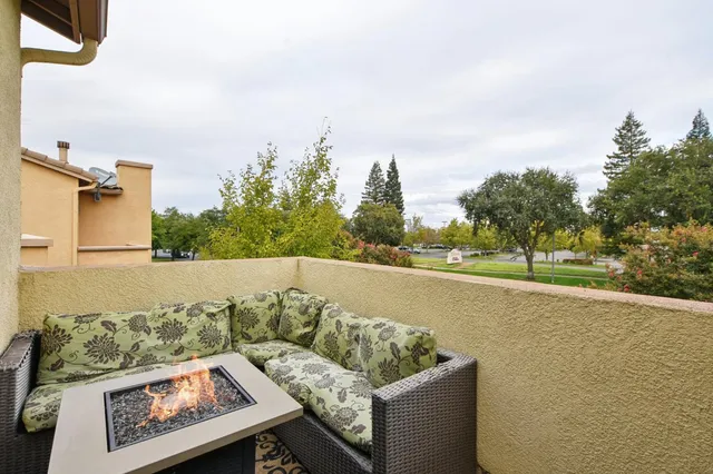 a kitchen with a sink cabinets and wooden floor