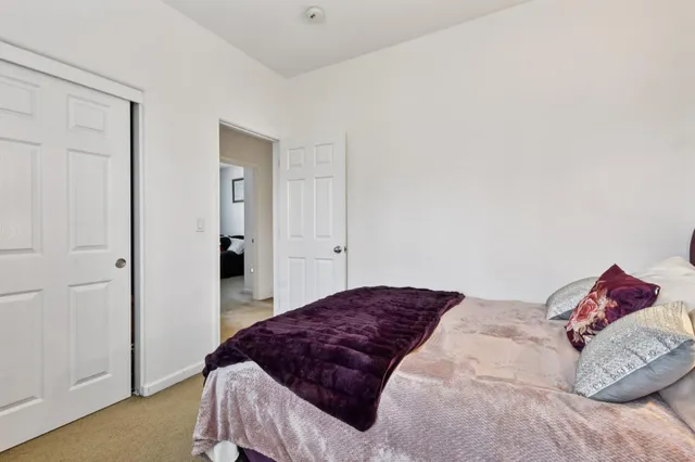a view of a hallway with washer and dryer