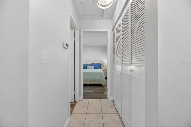 a bathroom with a toilet sink a mirror and vanity