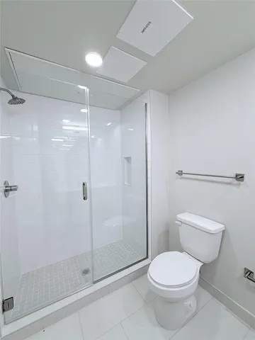 a picture of a room with furniture and clutter