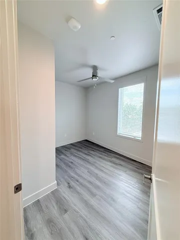 a large kitchen with a refrigerator a stove a sink and a refrigerator