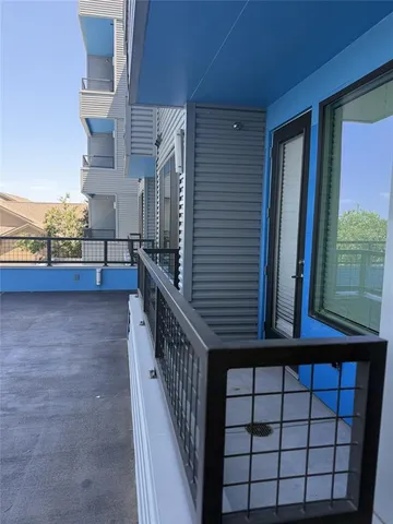 a bathroom with a shower and a toilet