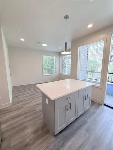 a view of living room with furniture and window