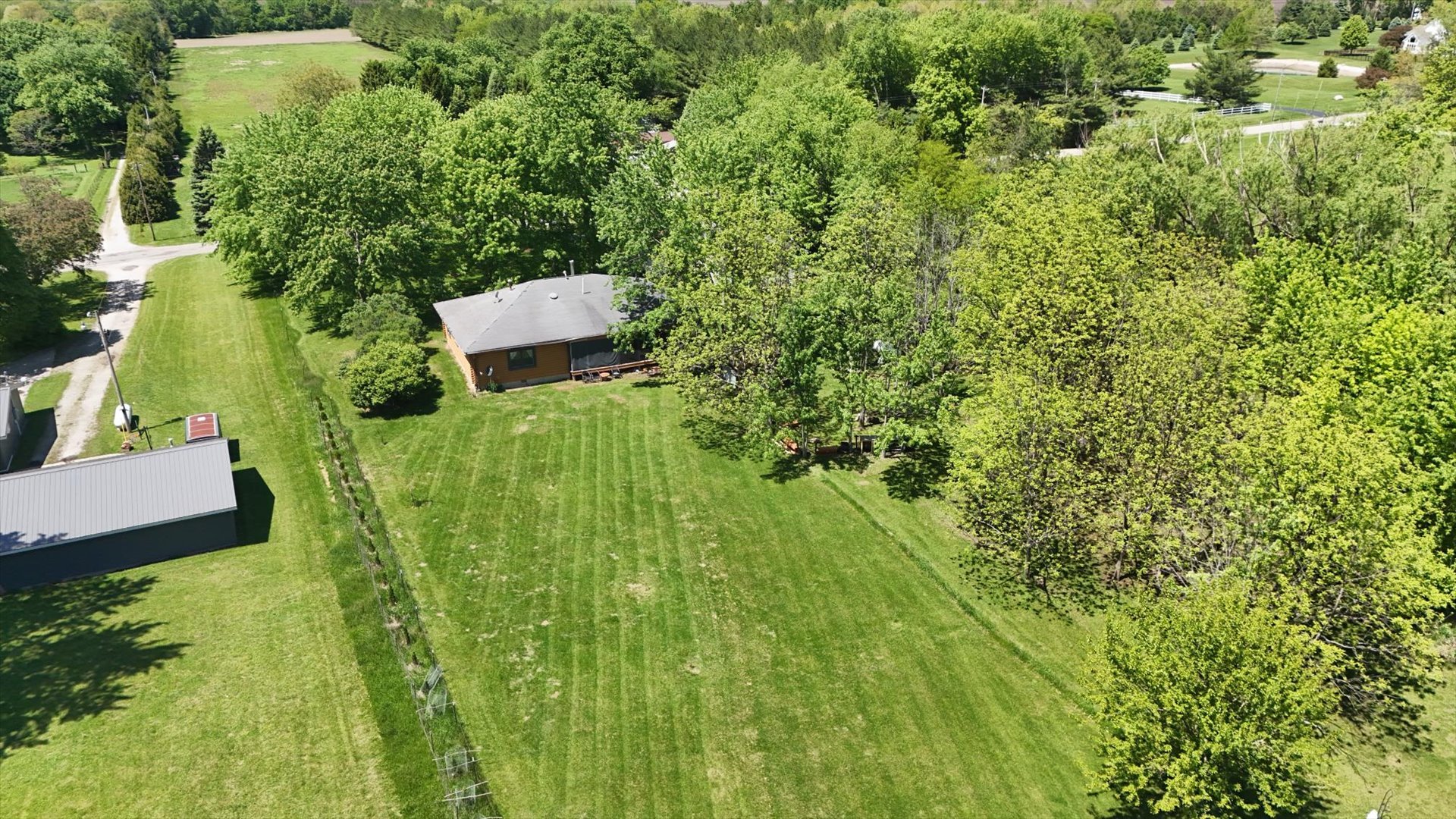 2431 North 1450 East Road Mansfield, IL 61854 - Photo 71 of 78 a view of a back yard from a garden